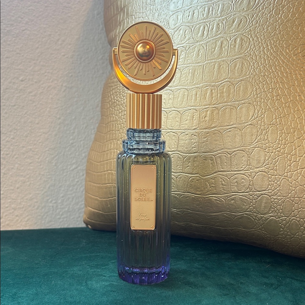 Cirque du Soleil Perfume Bottle with Gold and Purple Accents